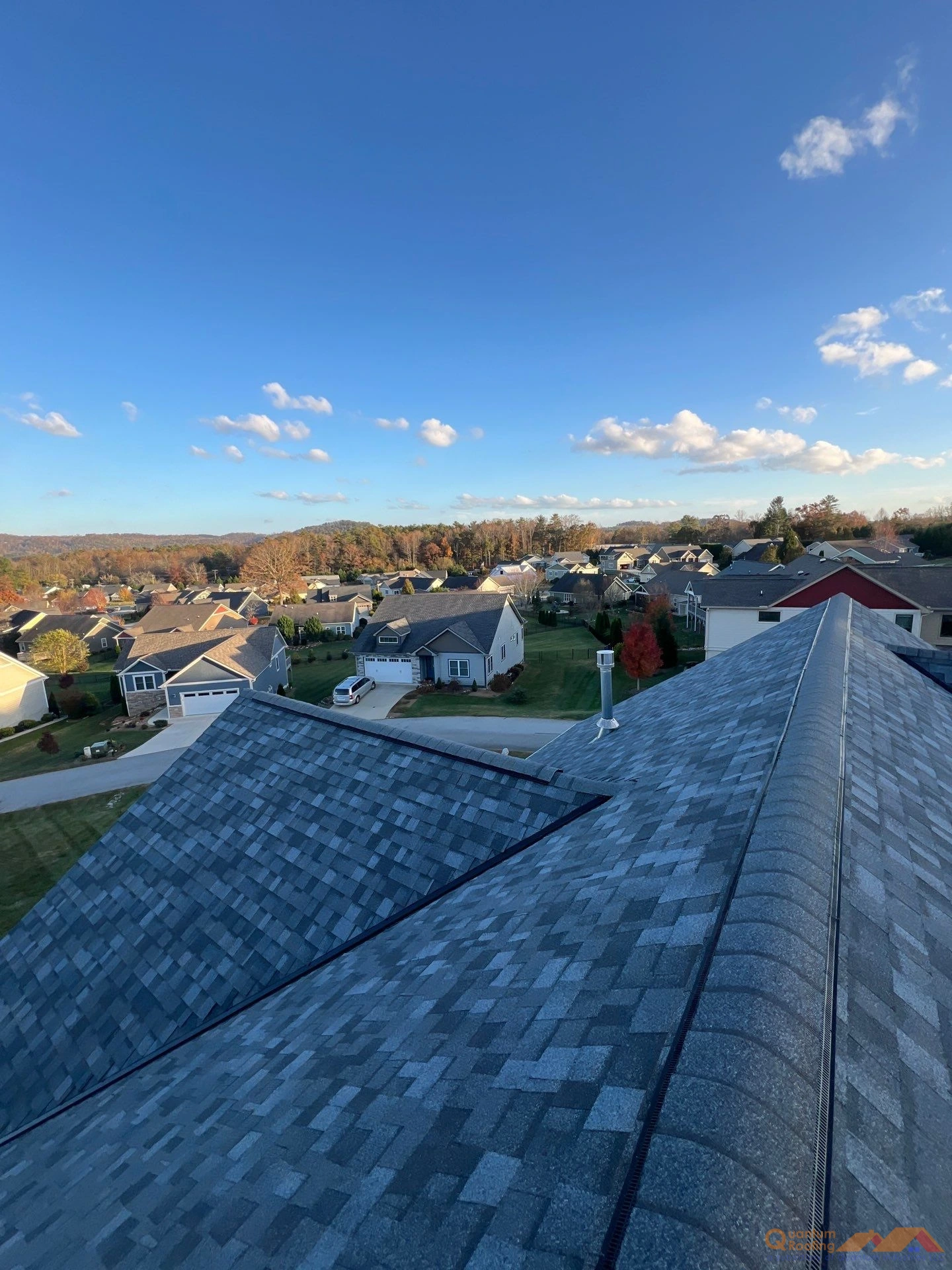 Roof Replacement project in Hendersonville, NC showcasing a before image. 