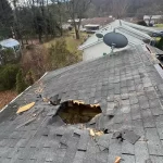 Hole In Asphalt Roof
