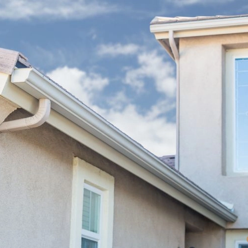 Gutter On Stucco Home