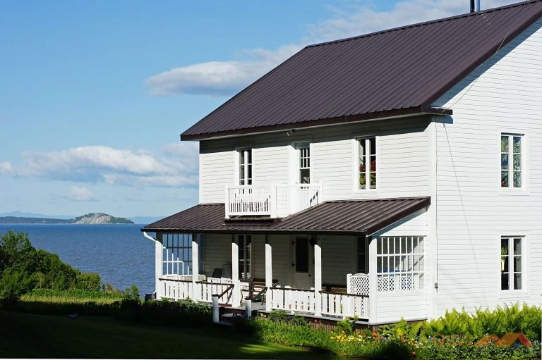 White Home with Metal Roof